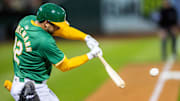 Sep 20, 2024; Oakland, California, USA; Oakland Athletics shortstop Max Schuemann (12) flies out in the the third inning against the New York Yankees at Oakland-Alameda County Coliseum. Mandatory Credit: Bob Kupbens-Imagn Images