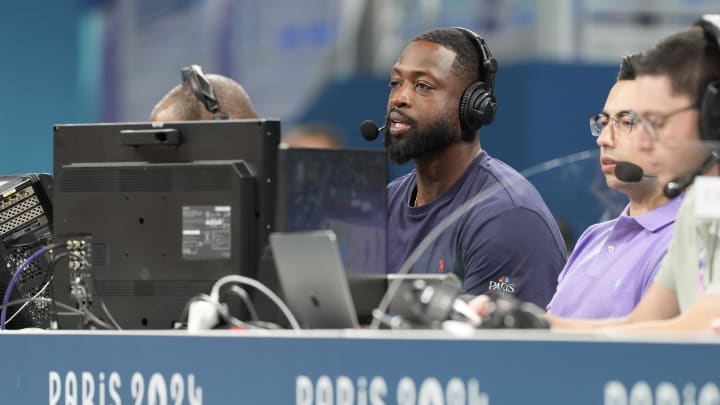 Jul 27, 2024; Villeneuve-d'Ascq, France; Dwyane Wade looks on from the media bench during the first half between Canada and Greece during the Paris 2024 Olympic Summer Games at Stade Pierre-Mauroy. Mandatory Credit: John David Mercer-USA TODAY Sports