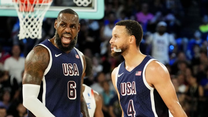 Aug 10, 2024; Paris, France; United States forward LeBron James (6) and United States guard Stephen Curry (4) in the men's basketball gold medal game during the Paris 2024 Olympic Summer Games at Accor Arena. 