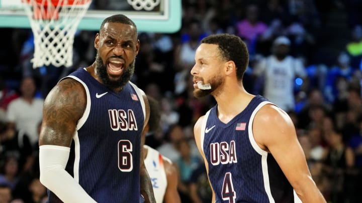 Aug 10, 2024; Paris, France; United States forward LeBron James (6) and United States guard Stephen Curry (4) in the men's basketball gold medal game during the Paris 2024 Olympic Summer Games at Accor Arena. 