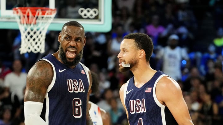 Aug 10, 2024; Paris, France; United States guard Lebron James (6) and United States shooting guard Stephen Curry (4) in the men's basketball gold medal game during the Paris 2024 Olympic Summer Games at Accor Arena. Mandatory Credit: Rob Schumacher-USA TODAY Sports