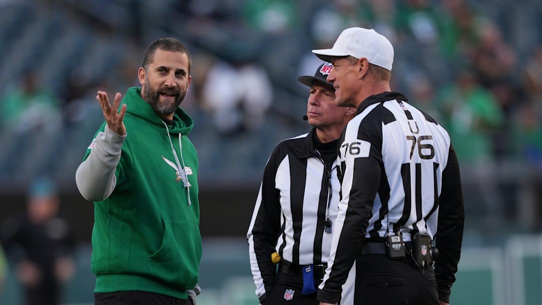 Philadelphia Eagles head coach Nick Sirianni (L) and NFL referee Alan Eck (R)