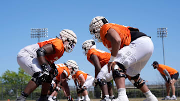 Oklahoma State offensive lineman 
Noah McKinney, left, and Jakobe Sanders runs a drill during a Spring football practice at Oklahoma State University in Stillwater, Okla., Tuesday, April, 8, 2025.