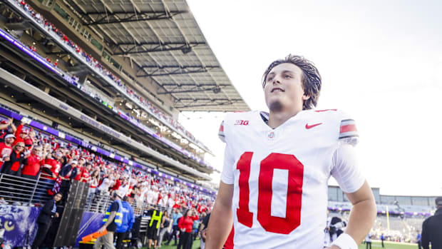 Ohio State Buckeyes quarterback Julian Sayin (10) walks to the locker room following a victory against the Washington Huskies