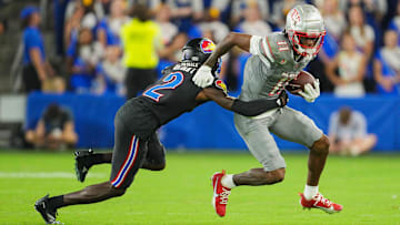 UNLV Rebels wide receiver Ricky White III (11) runs with the ball against Kansas Jayhawks cornerback Cobee Bryant (2) during the second half at Children's Mercy Park. Mandatory Credit: Jay Biggerstaff-Imagn Images