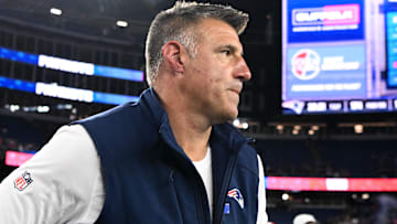 New England Patriots head coach Mike Vrabel walks off the field after a game against the Washington Commanders at Gillette Stadium.