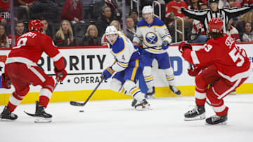 Nov 2, 2024; Detroit, Michigan, USA; Buffalo Sabres defenseman Bowen Byram (4) handles the puck during the third period of the game against the Detroit Red Wings at Little Caesars Arena. Mandatory Credit: Brian Bradshaw Sevald-Imagn Images