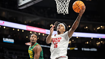 Mar 13, 2025; Kansas City, MO, USA; Texas Tech Red Raiders forward JT Toppin (15) shoots the ball during the first half against the Baylor Bears at T-Mobile Center. Mandatory Credit: William Purnell-Imagn Images