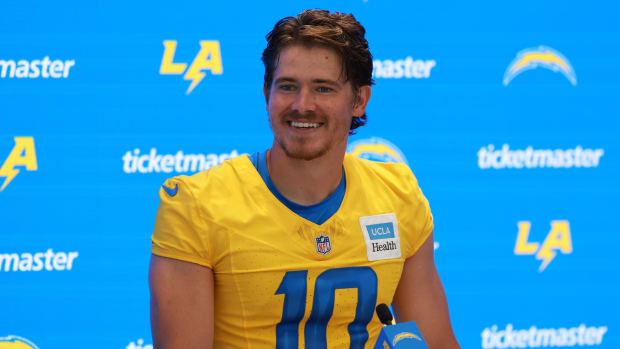 Los Angeles Chargers quarterback Justin Herbert (10) speaks to the media after the first day of training camp at The Bolt