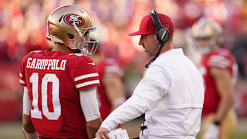 San Francisco 49ers quarterback Jimmy Garoppolo (L) and head coach Kyle Shanahan (R)