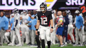 Aug 15, 2025; Atlanta, Georgia, USA; Atlanta Falcons quarterback Easton Stick (12) in action against the Tennessee Titans in the first quarter at Mercedes-Benz Stadium. Mandatory Credit: Brett Davis-Imagn Images