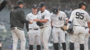 May 5, 2024; Bronx, New York, USA; New York Yankees starting pitcher Nestor Cortes (65) hands the ball to manager Aaron Boone (17) after being relieved during the seventh inning against the Detroit Tigers at Yankee Stadium. Mandatory Credit: Vincent Carchietta-USA TODAY Sports