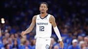 Apr 22, 2025; Oklahoma City, Oklahoma, USA; Memphis Grizzlies guard Ja Morant (12) walks down the court in the third quarter of game two of first round for the 2024 NBA Playoffs against the Oklahoma City Thunder at Paycom Center. Mandatory Credit: Alonzo Adams-Imagn Images
