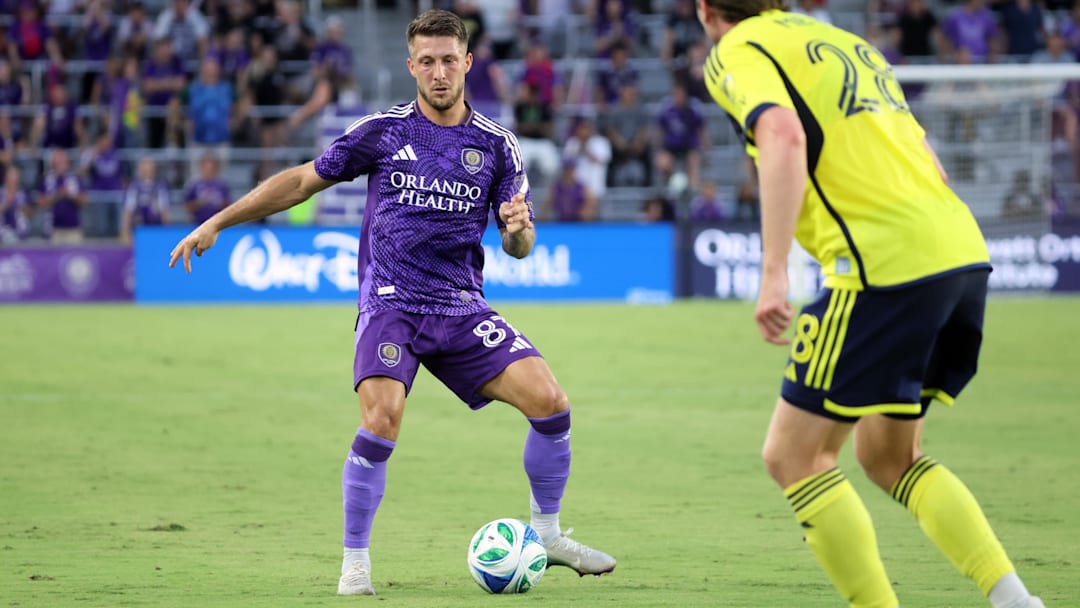 May 21, 2025; Orlando, Florida, USA; Orlando City forward Marco Pasalic (87) dribbles against the Nashville SC during the first half at Inter&Co Stadium. Mandatory Credit: Kim Klement Neitzel-Imagn Images