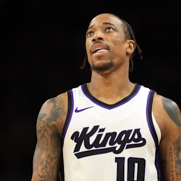 Mar 14, 2025; Phoenix, Arizona, USA; Sacramento Kings forward DeMar DeRozan (10) against the Phoenix Suns at Footprint Center. Mandatory Credit: Mark J. Rebilas-Imagn Images