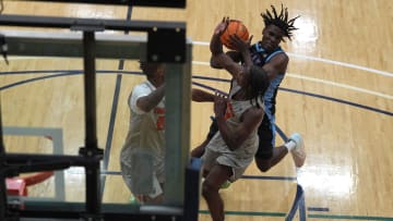 Team WhyvNot's Cheikh Yessoufou (24) moves towards the basket during the Team Takeover and WhyNot game at the Nike Peach Jam at Riverview Park Activities Center on July 17, 2024. Team Takeover won 64-62.