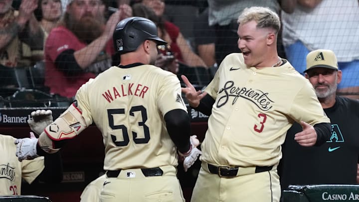 Sep 10, 2024; Phoenix, Arizona, USA; Arizona Diamondbacks first base Christian Walker (53) celebrates with Joc Pederson (3) after hitting a solo home run against the Texas Rangers in the first inning at Chase Field. Mandatory Credit: Rick Scuteri-Imagn Images