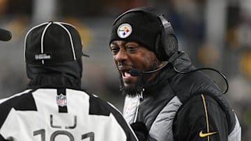 Jan 4, 2025; Pittsburgh, Pennsylvania, USA; Pittsburgh Steelers head coach Mike Tomlin talks with an official against the Cincinnati Bengals during the second quarter at Acrisure Stadium. Mandatory Credit: Barry Reeger-Imagn Images