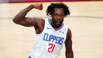 Jun 22, 2021; Phoenix, Arizona, USA; Los Angeles Clippers guard Patrick Beverley (21) flexes his muscle as he celebrates a shot against the Phoenix Suns in the second half during game two of the Western Conference Finals for the 2021 NBA Playoffs at Phoenix Suns Arena. Mandatory Credit: Mark J. Rebilas-Imagn Images