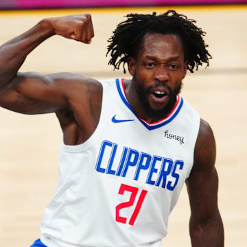 Jun 22, 2021; Phoenix, Arizona, USA; Los Angeles Clippers guard Patrick Beverley (21) flexes his muscle as he celebrates a shot against the Phoenix Suns in the second half during game two of the Western Conference Finals for the 2021 NBA Playoffs at Phoenix Suns Arena. Mandatory Credit: Mark J. Rebilas-Imagn Images