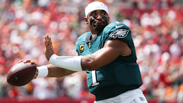 Sep 28, 2025; Tampa, Florida, USA; Philadelphia Eagles quarterback Jalen Hurts (1) warms up before the start of the game against the Tampa Bay Buccaneers at Raymond James Stadium. Mandatory Credit: Nathan Ray Seebeck-Imagn Images