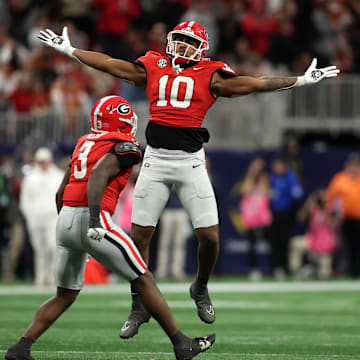 Dec 7, 2024; Atlanta, GA, USA; Georgia Bulldogs linebacker Damon Wilson II (10), linebacker Jalon Walker (11) and linebacker CJ Allen (3) react during the second half in the 2024 SEC Championship game at Mercedes-Benz Stadium. Mandatory Credit: Brett Davis-Imagn Images