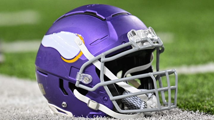 Nov 27, 2023; Minneapolis, Minnesota, USA; A Minnesota Vikings helmet sits idle on the field before the game between the Minnesota Vikings and the Chicago Bears at U.S. Bank Stadium.  