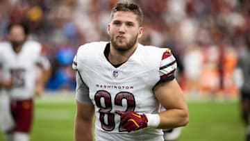 Sep 29, 2024; Glendale, Arizona, USA; Washington Commanders tight end Ben Sinnott (82) against the Arizona Cardinals at State Farm Stadium. Mandatory Credit: Mark J. Rebilas-Imagn Images