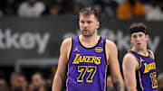 Apr 9, 2025; Dallas, Texas, USA; Los Angeles Lakers guard Luka Doncic (77) and guard Austin Reaves (15) during the game between the Dallas Mavericks and the Los Angeles Lakers at American Airlines Center. Mandatory Credit: Jerome Miron-Imagn Images