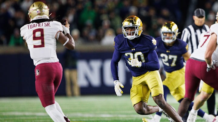 Notre Dame defensive lineman Bryce Young (30) chases down Florida State running back Lawrance Toafili (9) during a NCAA college football game at Notre Dame Stadium on Saturday, Nov. 9, 2024, in South Bend.