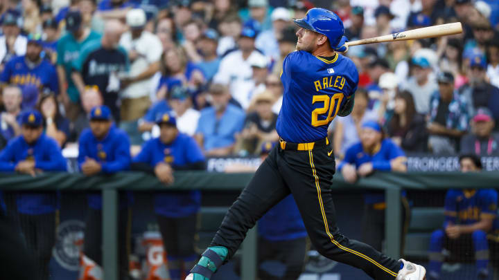 Seattle Mariners first baseman Luke Raley hits a three-run home run against the Philadelphia Phillies on Friday at T-Mobile Park.