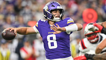 Aug 16, 2025; Minneapolis, Minnesota, USA; Minnesota Vikings quarterback Sam Howell (8) throws a pass against the New England Patriots during the first quarter at U.S. Bank Stadium.