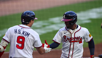 Sep 8, 2025; Atlanta, Georgia, USA; Atlanta Braves second baseman Ozzie Albies (1) celebrates after a home run with shortstop Ha-Seong Kim (9) against the Chicago Cubs in the first inning at Truist Park. Mandatory Credit: Brett Davis-Imagn Images
