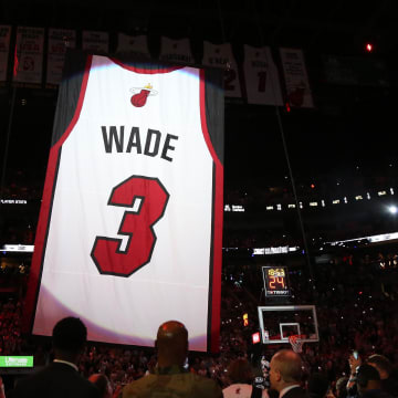 Feb 22, 2020; Miami, Florida, USA; The jersey of Miami Heat former player Dwyane Wade is raised to the rafters as his number is retired during halftime of a game between the Cleveland Cavaliers and the Heat at American Airlines Arena. Mandatory Credit: Kim Klement-USA TODAY Sports