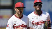 Apr 23, 2025; Cleveland, Ohio, USA; Cleveland Guardians left fielder Steven Kwan (38) and center fielder Angel Martinez (1) run off the field during the sixth inning against the New York Yankees at Progressive Field. Mandatory Credit: Ken Blaze-Imagn Images