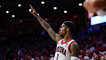Nov 9, 2024; Tucson, Arizona, USA; Arizona Wildcats guard Caleb Love (1) holds up the number three as the Arizona Wildcats just made a three-point basket during the second half against the Old Dominion Monarchs at McKale Center. Mandatory Credit: Aryanna Frank-Imagn Images