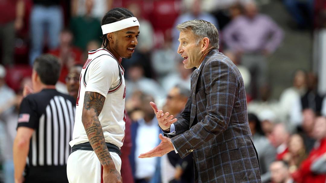 Feb 18, 2026; Tuscaloosa, Alabama, USA; Alabama Crimson Tide head coach Nate Oats speaks with Alabama Crimson Tide guard Labaron Philon (0) during the second half against the Arkansas Razorbacks at Coleman Coliseum. Mandatory Credit: David Leong-Imagn Images