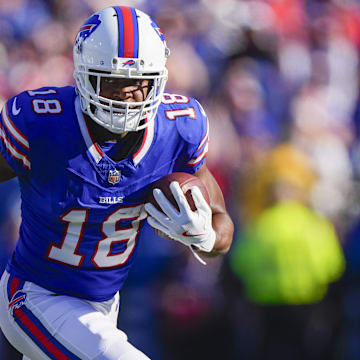 Oct 20, 2024; Orchard Park, New York, USA; Buffalo Bills wide receiver Amari Cooper (18) runs with the ball after making a catch against the Tennessee Titans during the second half at Highmark Stadium. 