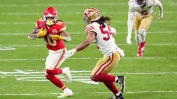 Feb 11, 2024; Paradise, Nevada, USA; Kansas City Chiefs running back Isiah Pacheco (10) runs against San Francisco 49ers linebacker Fred Warner (54) during overtime in Super Bowl LVIII at Allegiant Stadium. Mandatory Credit: Stephen R. Sylvanie-USA TODAY Sports