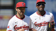Apr 23, 2025; Cleveland, Ohio, USA; Cleveland Guardians left fielder Steven Kwan (38) and center fielder Angel Martinez (1) run off the field during the sixth inning against the New York Yankees at Progressive Field. Mandatory Credit: Ken Blaze-Imagn Images
