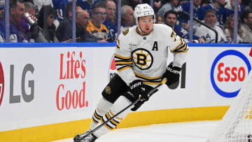 May 2, 2024; Toronto, Ontario, CAN;   Boston Bruins defenseman Charlie McAvoy (73) skates with the puck against the Toronto Maple Leafs in the first period in game six of the first round of the 2024 Stanley Cup Playoffs at Scotiabank Arena. Mandatory Credit: Dan Hamilton-USA TODAY Sports
