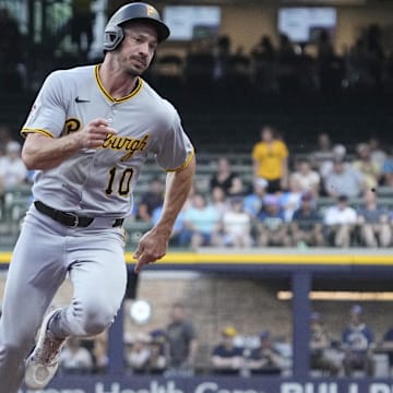 Jun 23, 2025; Milwaukee, Wisconsin, USA; Pittsburgh Pirates outfielder Bryan Reynolds (10) runs to third base and then scores a run against the Milwaukee Brewers in the first i  at American Family Field. Mandatory Credit: Michael McLoone-Imagn Images