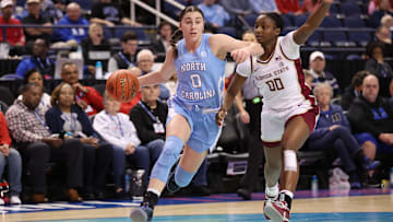 Mar 7, 2025; Greensboro, NC, USA;  North Carolina Tar Heels guard Lanie Grant (0) drives to the basket during the second quarter at First Horizon Coliseum. Mandatory Credit: Cory Knowlton-Imagn Images