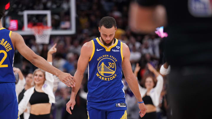 Apr 16, 2024; Sacramento, California, USA; Golden State Warriors guard Stephen Curry (30) walks towards the team bench during a timeout against the Sacramento Kings in the fourth quarter during a play-in game for the 2024 NBA playoffs at the Golden 1 Center.