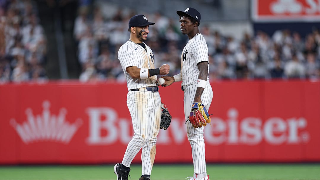 Apr 17, 2026; Bronx, New York, USA; New York Yankees second baseman Jazz Chisholm Jr. (13) and shortstop Jose Caballero (72) react during the ninth inning against the Kansas City Royals at Yankee Stadium. Mandatory Credit: Vincent Carchietta-Imagn Images