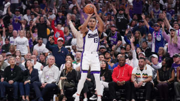 Apr 16, 2024; Sacramento, California, USA; Sacramento Kings forward Keegan Murray (13) shoots the ball against the Golden State Warriors in the first quarter during a play-in game of the 2024 NBA playoffs at the Golden 1 Center. Mandatory Credit: Cary Edmondson-USA TODAY Sports