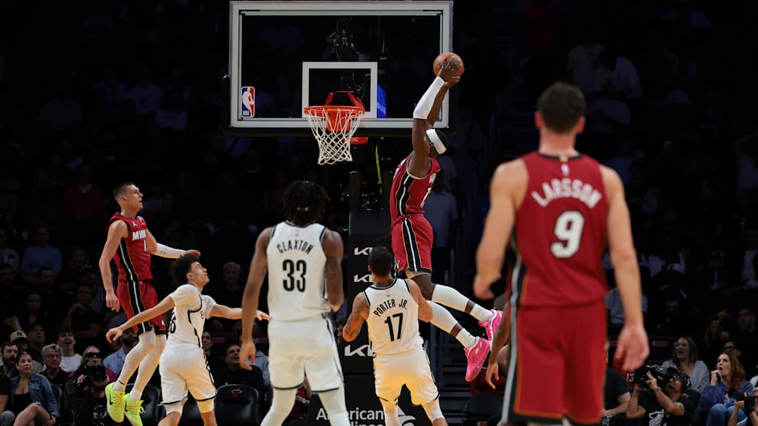 Mar 5, 2026; Miami, Florida, USA; Miami Heat center Bam Adebayo (13) dunks against the Brooklyn Nets during the first quarter at Kaseya Center. Mandatory Credit: Sam Navarro-Imagn Images
