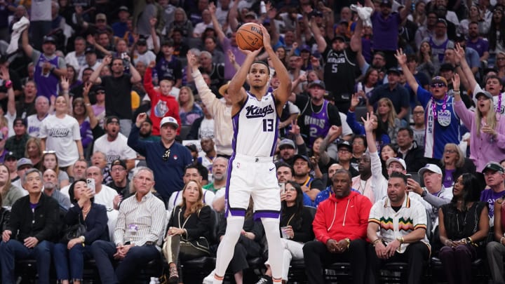 Apr 16, 2024; Sacramento, California, USA; Sacramento Kings forward Keegan Murray (13) shoots the ball against the Golden State Warriors in the first quarter during a play-in game of the 2024 NBA playoffs at the Golden 1 Center. Mandatory Credit: Cary Edmondson-USA TODAY Sports