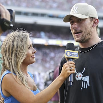 Sep 16, 2023; College Station, Texas, USA; Former Texas A&M Aggies player Johnny Manziel is interviewed during the game between the Aggies and Louisiana Monroe Warhawks at Kyle Field. Mandatory Credit: Troy Taormina-Imagn Images