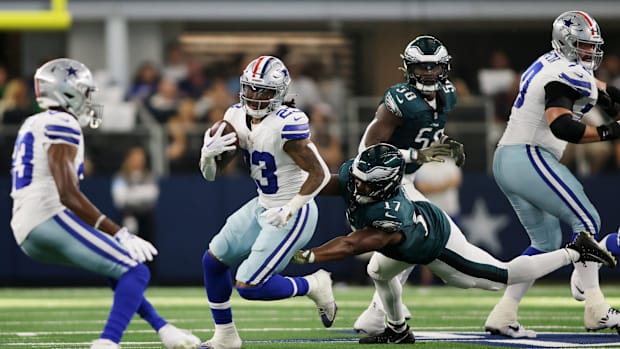 Rico Dowdle runs against the Eagle
